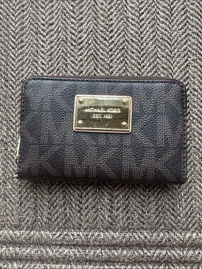 Michael Kors Jet Set Travel Continental Wallet in brown monogram coated canvas